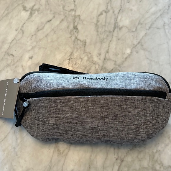 Therabody Handbags - Therabody crossbody bag - filled with amazing travel products.